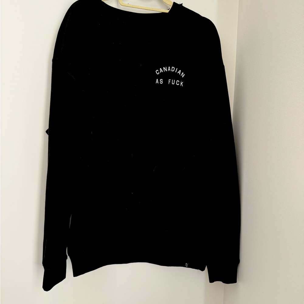 Peace collective “Canadian As F***” crewneck sweater